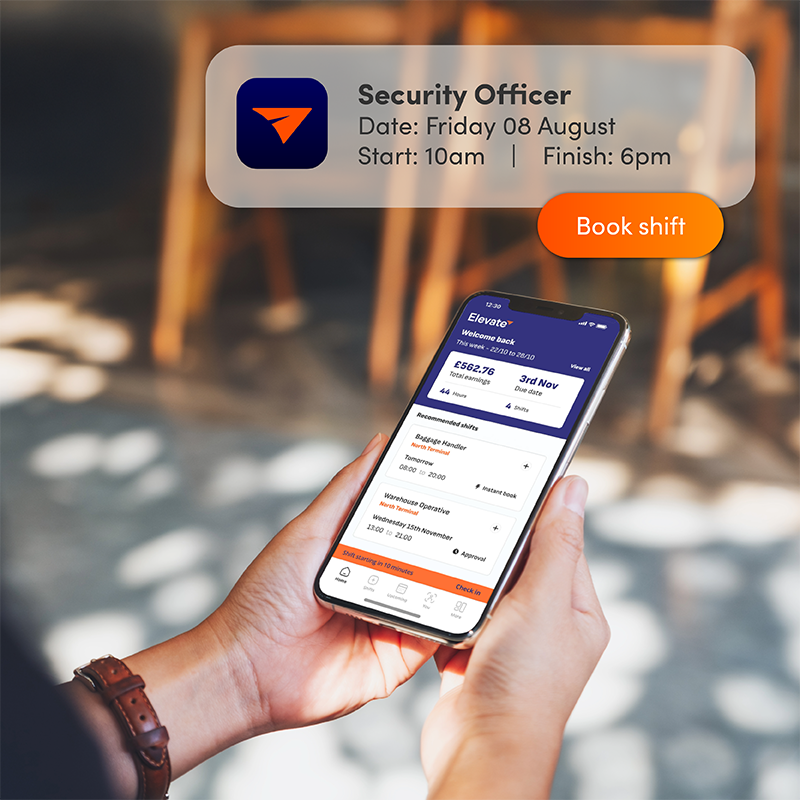 Person using Elevate app on phone with Security Officer job notification, demonstrating easy shift booking for security staff scheduling.